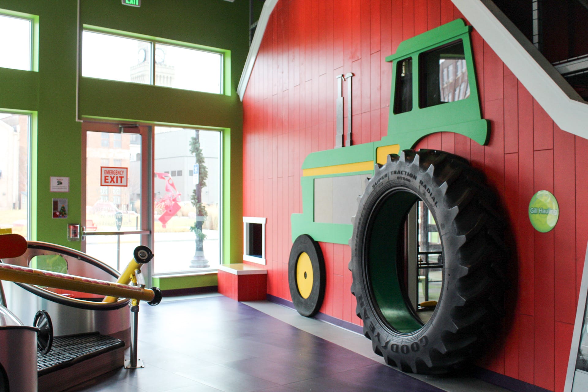 Tractor façade on barn in exhibit.